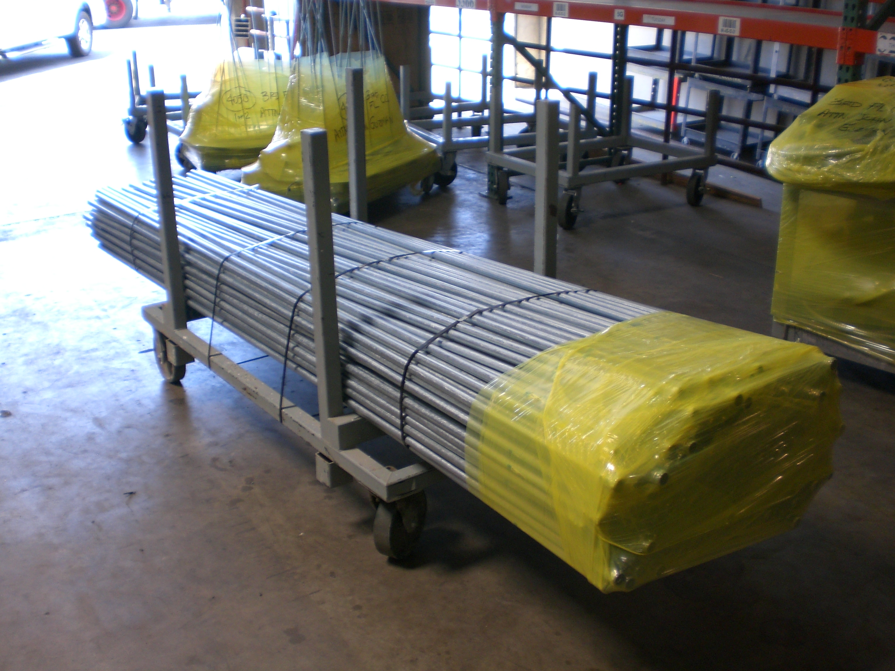 Prefab conduit bundled on a transport cart